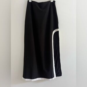 Elegant Black Skirt with White Trim